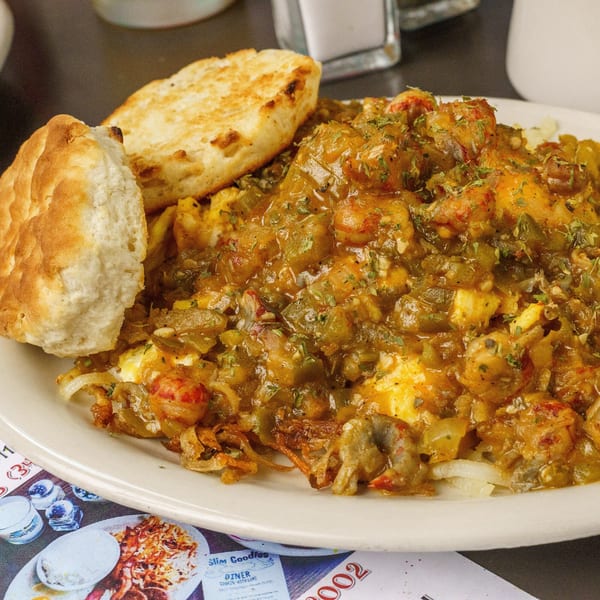 Slim Goodies Diner's crawfish étouffée with biscuits, a classic diner dish.